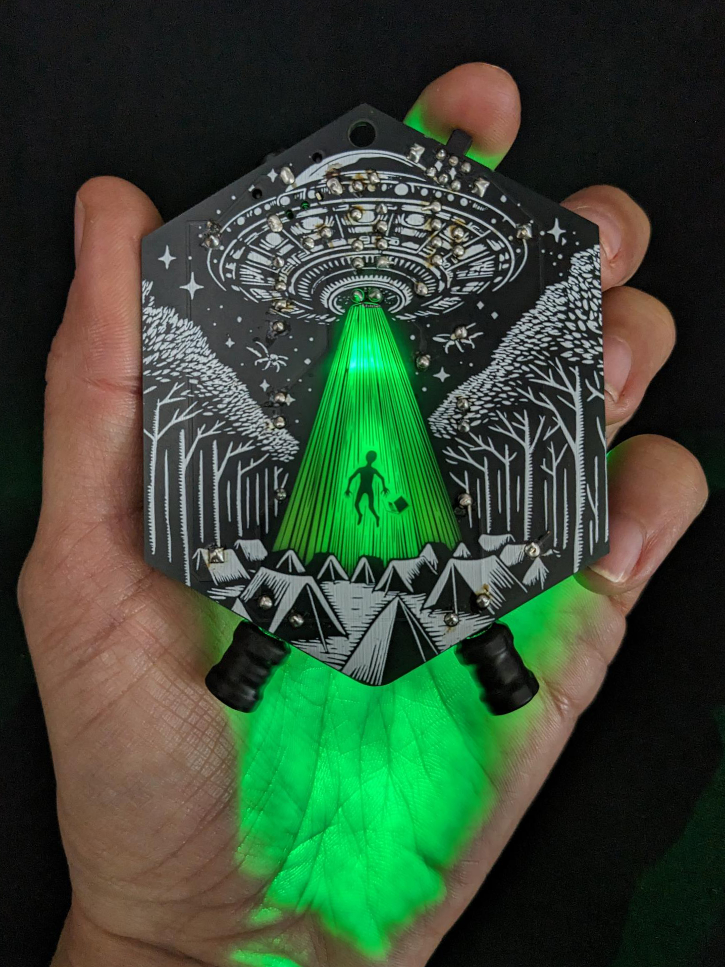 EMF Explorer Badge in Hand